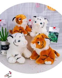 Group of lifelike orange and white Siberian tiger plush toys in a cute indoor setting