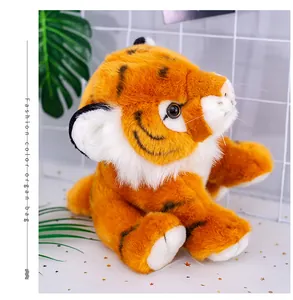 Detailed macro view of a soft, realistic tiger plush toy with fluffy orange and white fur