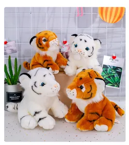 A group of realistic Siberian tiger plush toy dolls in orange and white colors