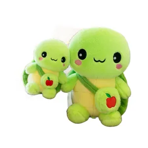 Two cute green turtle plush toys with small apple backpacks, soft plush pillows for kids