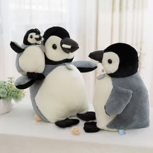 Set of three realistic penguin plush stuffed toys for kids in a soft home interior