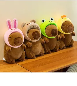 Detailed view of four capybara plushies featuring adorable rabbit, bear, frog, and chick hoods