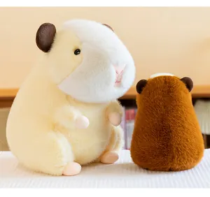 Detailed close-up showing the front and back views of two soft guinea pig plush toy dolls