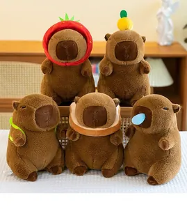 Group of five cute capybara plush toys with various fruit and bread accessories