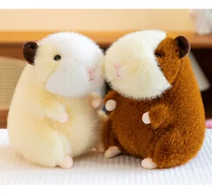 Detailed close-up view of two adorable and soft guinea pig plush toys with fluffy fur texture