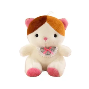 Cute plush animal doll with pink bow bib, perfect children's gift or desk decor