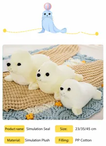 Detailed view of three realistic white seal plush toys in different sizes on a mat