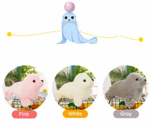 Macro view of plush seal dolls available in pink, white, and grey colors