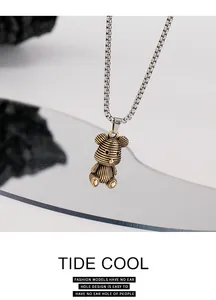 Detailed view of a hip-hop bear pendant necklace made of durable titanium steel.