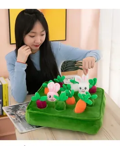 Asian model showing an interactive plush radish and rabbit pulling toy for toddler education