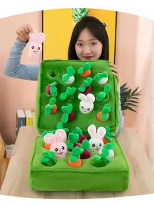 Interactive carrot pulling plush toy set for toddlers and kids displayed by a model