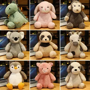Collection of cute plush animal toys including dinosaur rabbit penguin and panda for kids