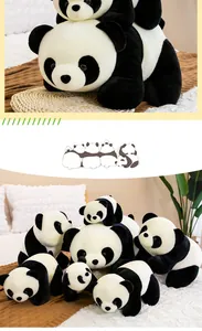 Group of cute crawling panda plush toys in various sizes displayed on a cozy bed setup.