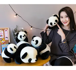 Collection of adorable panda plushies in different sizes displayed with a model