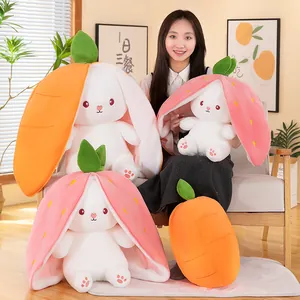 Cute strawberry and carrot themed plush rabbit toys shown in an indoor setting
