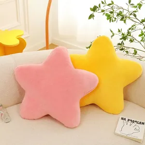 Set of 2 soft plush star-shaped pillows in pink and yellow for home decor