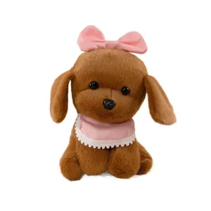 Adorable brown plush poodle toy featuring a pink bow and lace bib on white background