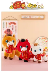 Three festive Year of the Horse plush zodiac dolls in red, tan and white colors.