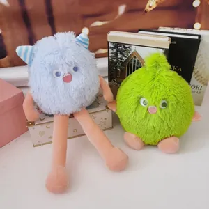 Pair of cute furry monster plush toys in blue and green colors for kids birthday gift decoration