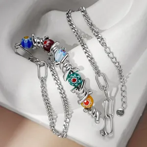 Trendy hip hop style thorn necklace featuring colorful Millefiori glass beads and mixed chains