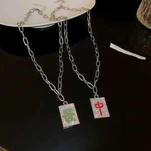 Sparkling rhinestone Mahjong tile necklaces featuring Chinese characters 'Zhong' and 'Fa'