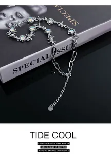 Punk style silver hip-hop necklace featuring moonstone accents and barbed wire design detail
