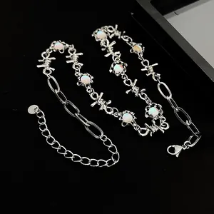 Unique trendy barbed wire choker necklace with moonstone accents for edgy hip-hop style