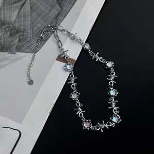 Hip hop style silver barbed wire necklace featuring iridescent moonstones for a gothic look