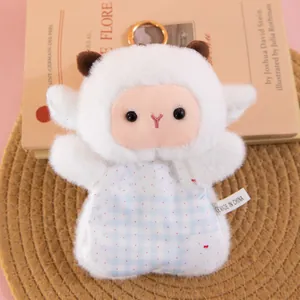 Close-up of a cute white sheep plush toy with soft fur and squishy beanbag body