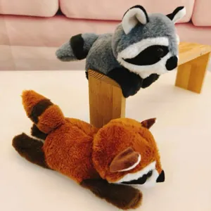 Detailed view of soft plush raccoon and red panda animal slap bracelets on a wooden stand.