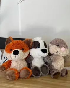 Set of three soft plush forest animal toys including an orange fox, a badger and an otter doll