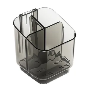 Transparent grey wall-mounted toothbrush holder with 3 compartments for bathroom storage.