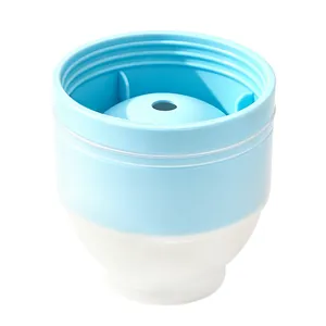Light blue and white silicone ice ball mold for making round whisky ice spheres