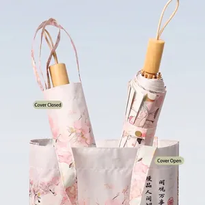 Double-layer floral sun umbrella with a versatile bag-style storage sleeve for women