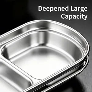 Stainless steel divided sauce dish with deep compartments for seasonings and dips.
