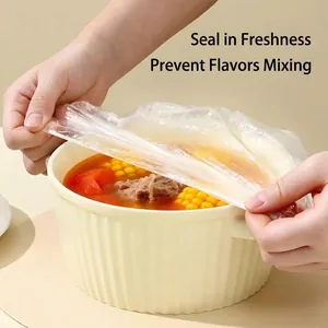 Disposable elastic food wrap covers for kitchen bowls, keeping leftovers fresh and safe.