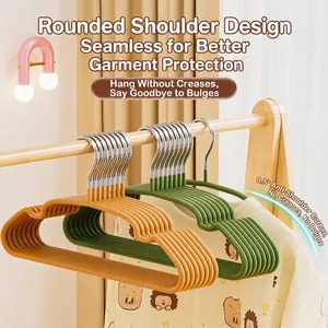 Ergonomic arc-shaped non-marking hangers for children's clothes in orange and green