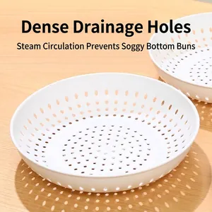 Round white plastic perforated colander plate for kitchen steaming and draining food