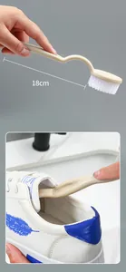 Detail view of 18cm long handle shoe brush for cleaning inside of sneakers