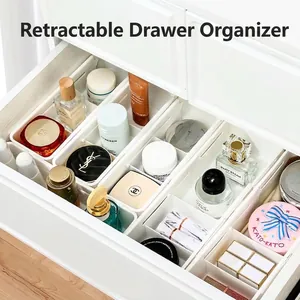 Adjustable white plastic drawer dividers for makeup and cosmetics storage