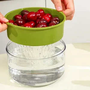 Double-layer fruit and vegetable washing draining basket with green colander and clear bowl