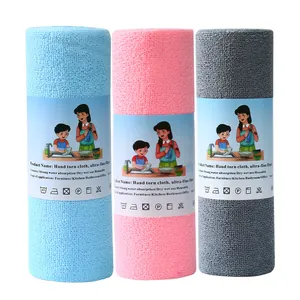 Set of three absorbent hand torn microfiber cleaning cloths in blue pink and grey rolls
