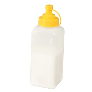800ml transparent plastic squeeze condiment bottle with yellow dust-proof cap.