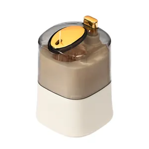 Modern automatic pop-up toothpick dispenser with gold press button and cream base