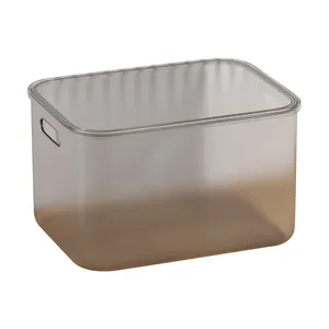 Transparent rectangular storage box with lid and tea-colored gradient effect