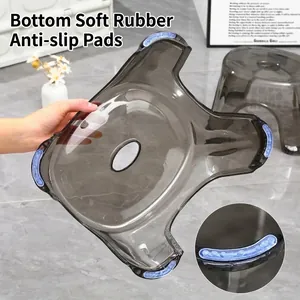 Moderner grauer transparenter Acryl-Hocker mit weichen Anti-Rutsch-Gummipads unten