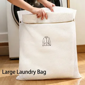 Durable large mesh laundry bag with embroidered jacket icon and secure zipper closure