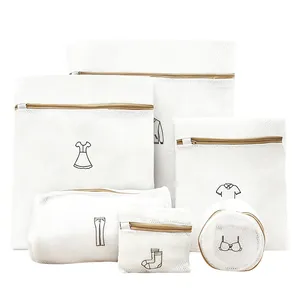 6-piece set of white mesh laundry bags with embroidered icons for clothing protection