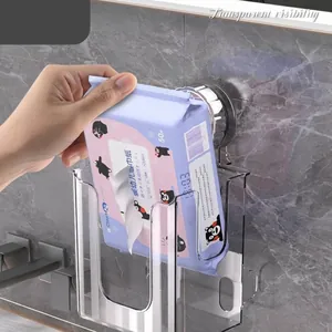 Wall-mounted transparent tissue dispenser for face towels and bathroom storage.