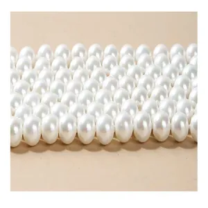 Macro view of lustrous white South Sea shell pearls loose beads for DIY jewelry accessories